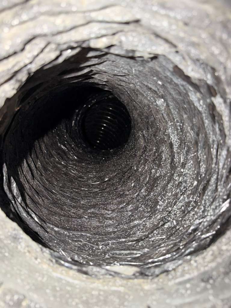 Air duct cleaning in progress